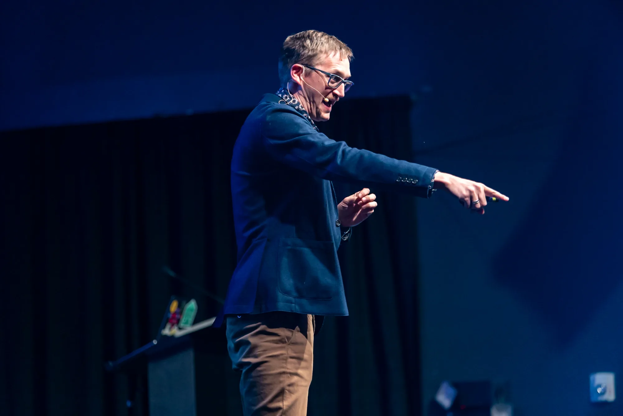 Keynote speaker engaging an audience on stage